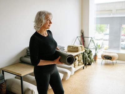 Corner of a calm room with a yoga mat and space for movement.